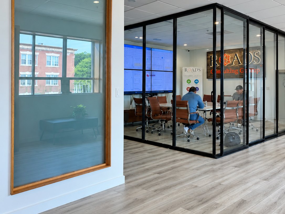 The glass conference room at the new Roads office in East Boston
