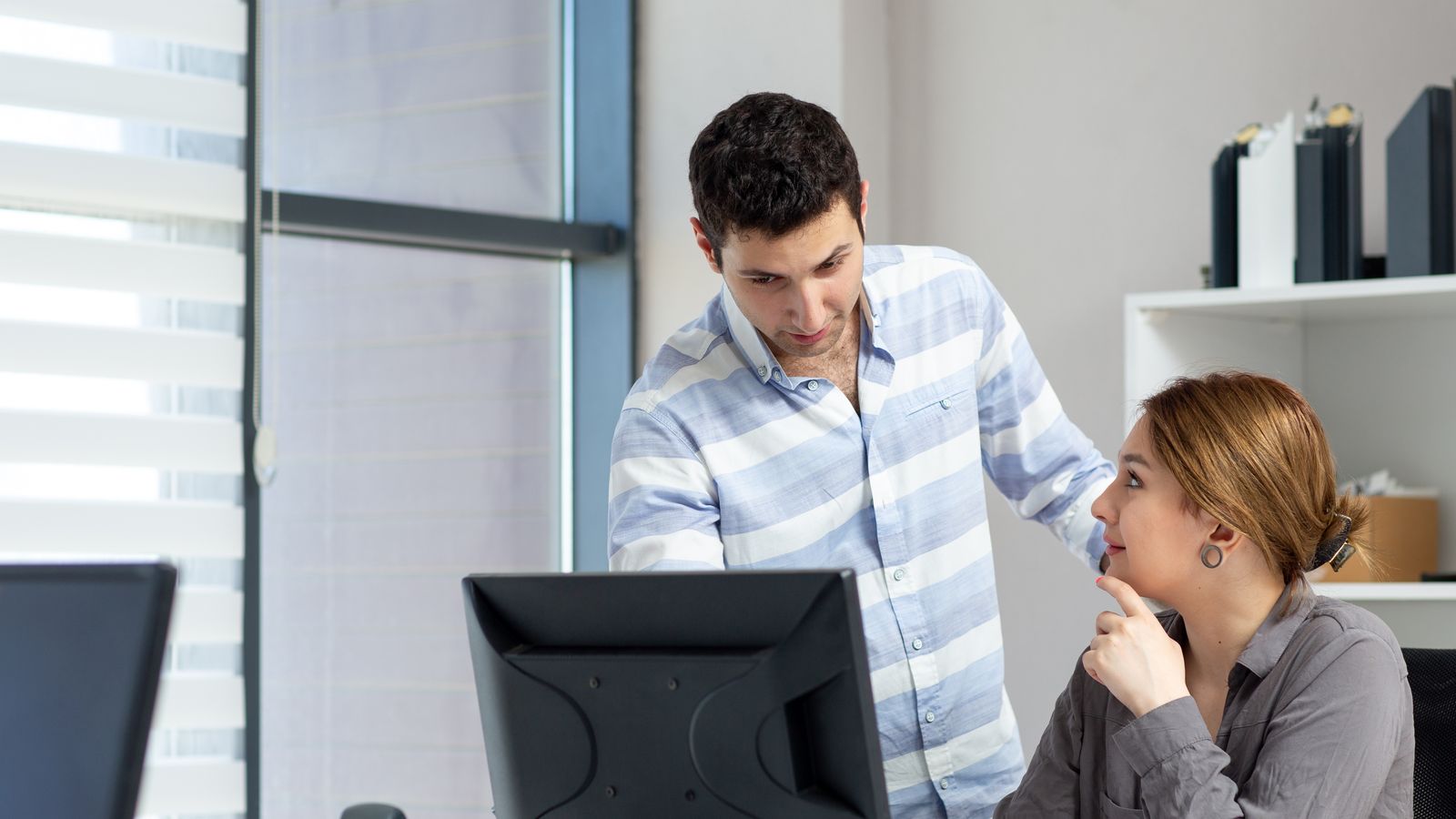 Business coach working one-on-one with a Travis County business owner